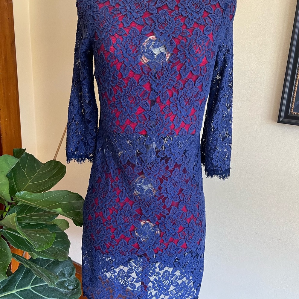 Designer blue lace evening dress with blue slip (not shown)
